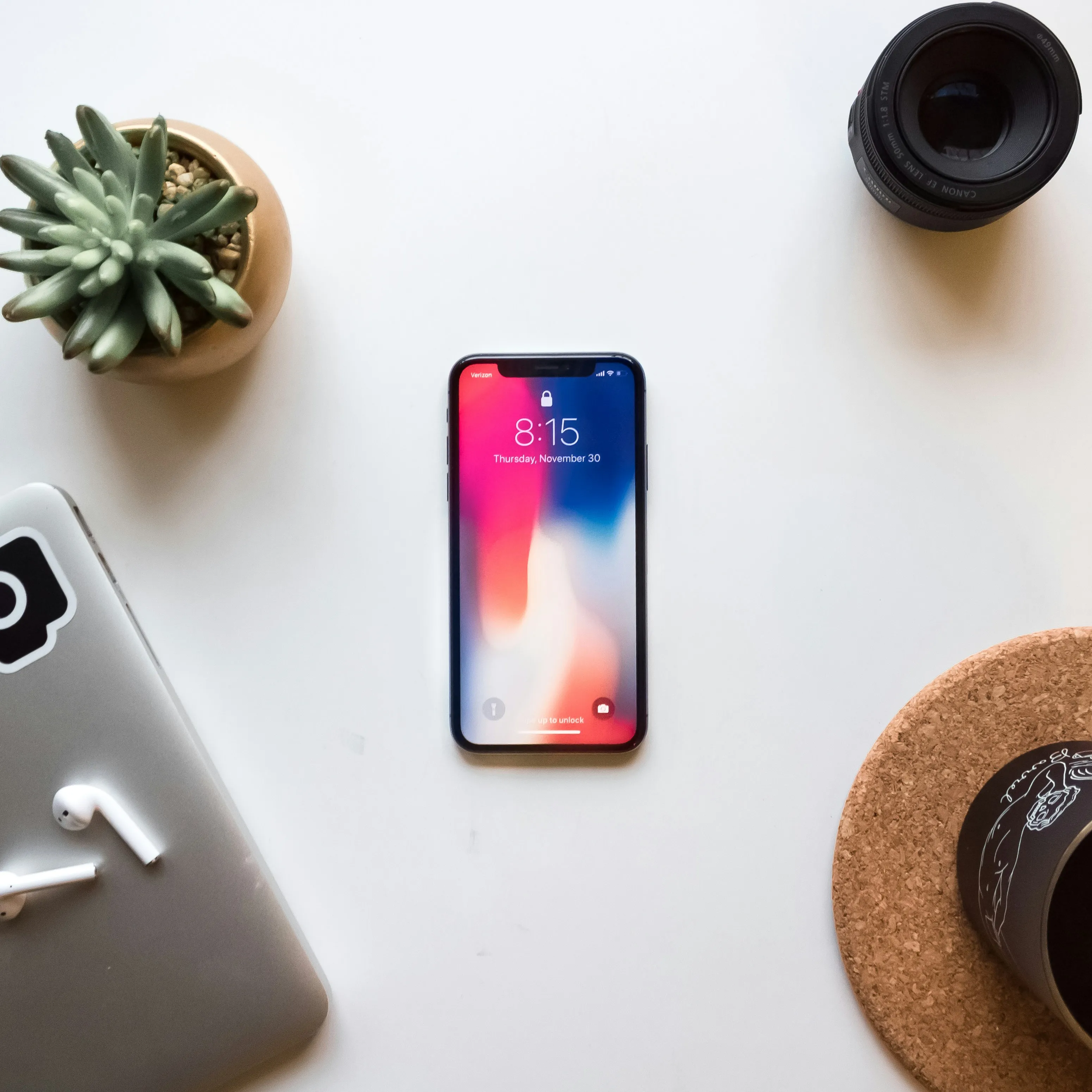 Traveler holding smartphone with global connectivity icons
